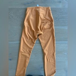 Orange Lululemon leggings. Size 2. Like new
